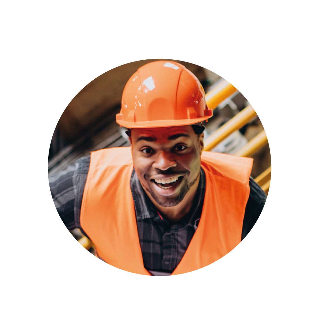 Photo of a construction worker wearing a hard hat and high vis