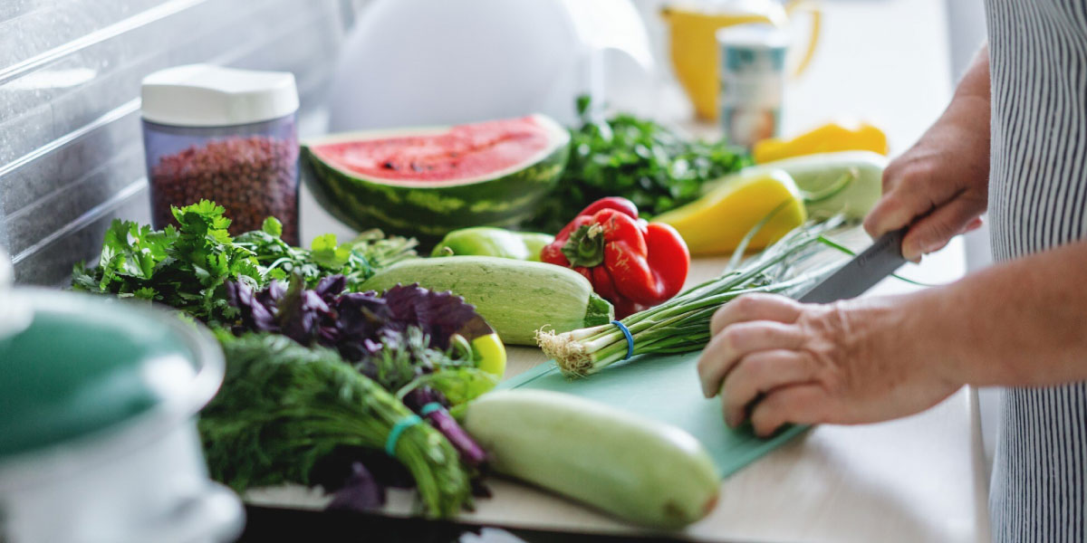 Photo of a chef chopping vegetables