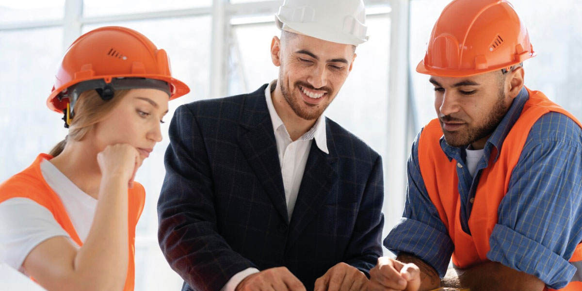 Photo of construction workers wearing PPE