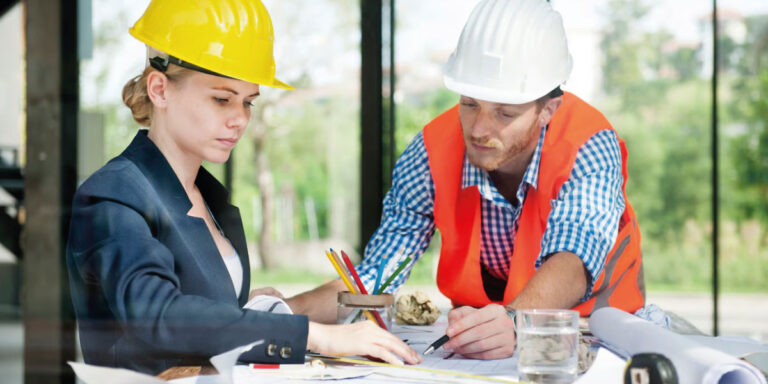 Photo of construction workers wearing PPE