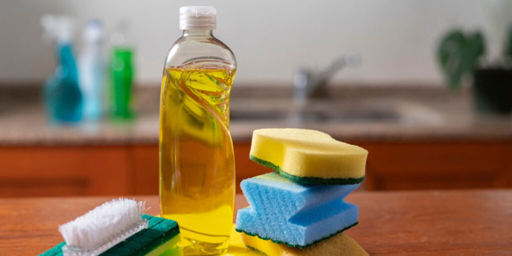 Photo of some washing up liquid and sponges