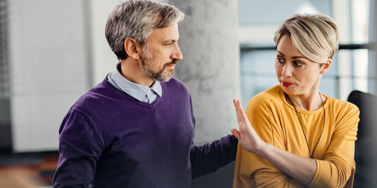 Photo of a man and a woman having a heated discussion