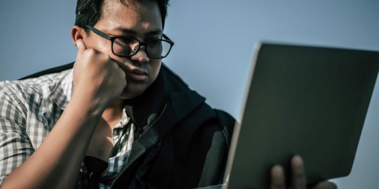 Photo of a worker using a tablet computer