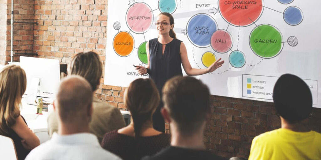 Photo of a woman giving a presentation