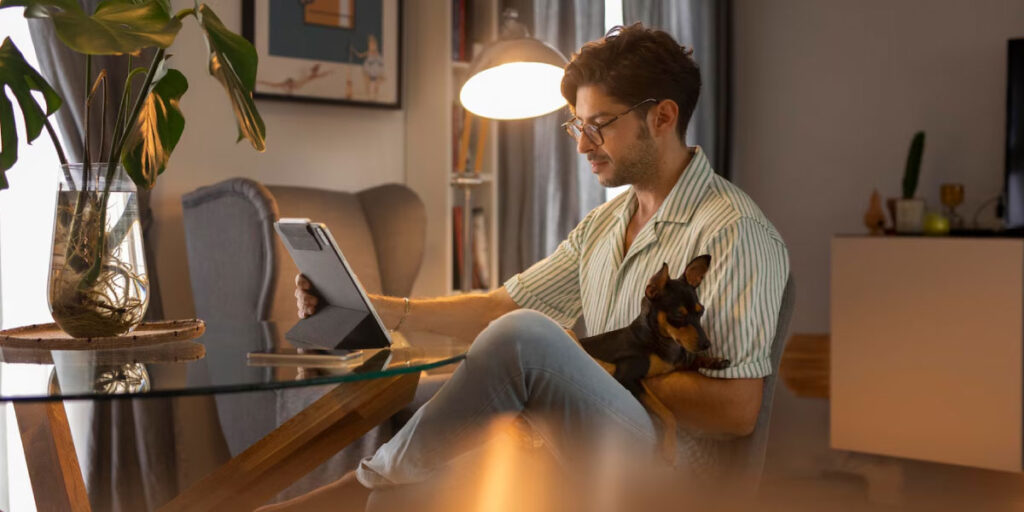 Photo of a man working from home