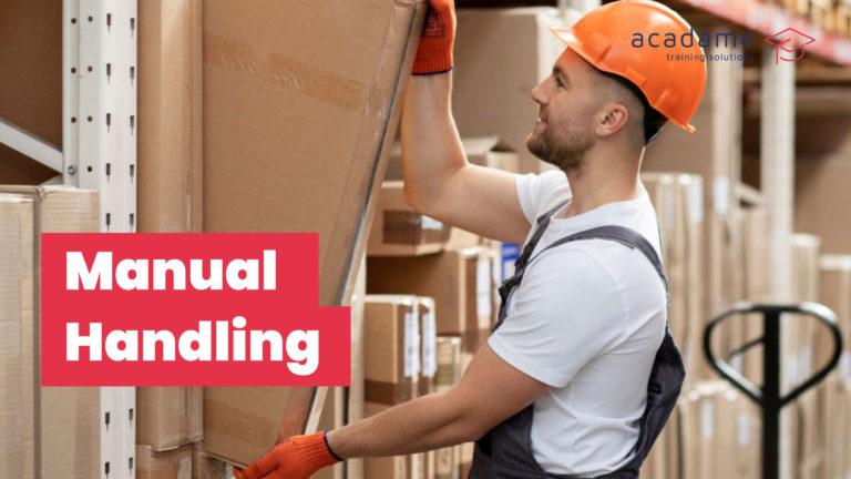 Worker lifting a large cardboard box in a warehouse during manual handling training