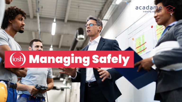 Manager leading an IOSH Managing Safely health and safety training session with workplace professionals