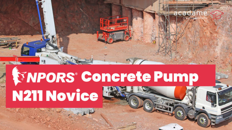 NPORS concrete pump training course image showing a concrete pump and mixer vehicle operating on a construction site