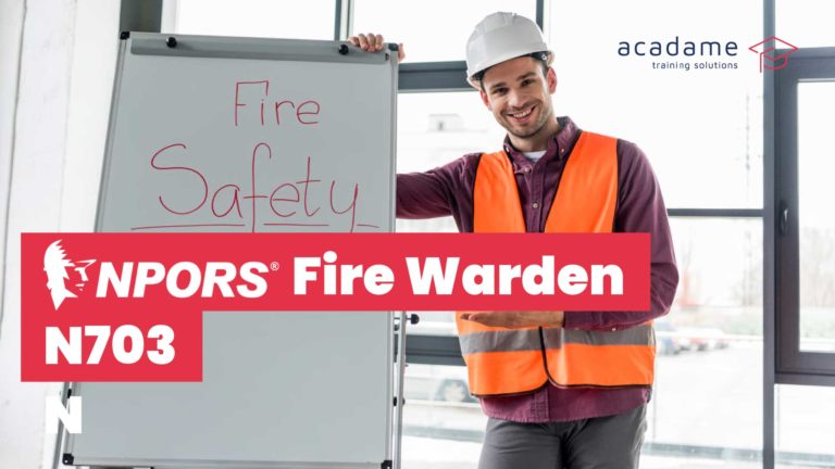 NPORS fire warden training course image showing a fire safety trainer presenting workplace fire safety information on a whiteboard