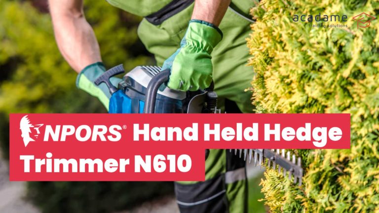 NPORS hand held hedge trimmer training course image showing an operative trimming a hedge with powered cutting equipment