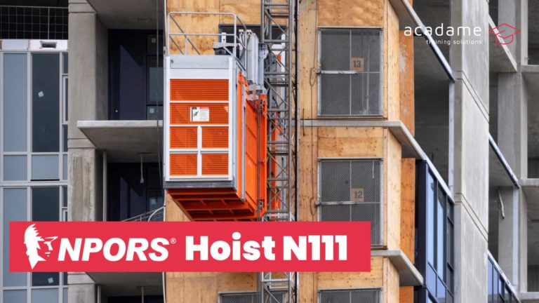 NPORS hoist training course image showing a construction hoist attached to a multi-storey building during site access operations