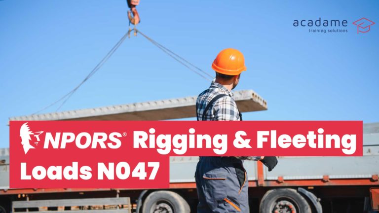 NPORS rigging and fleeting loads training course image showing an operative guiding a suspended load during lifting operations on site