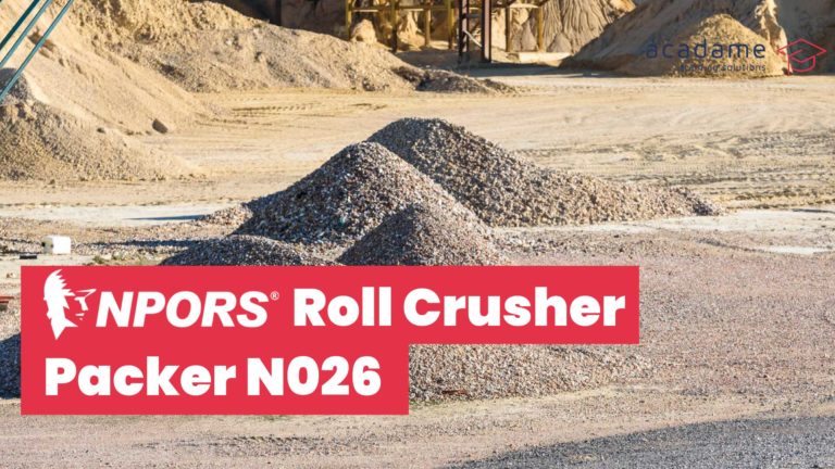 NPORS roll crusher packer training course image showing aggregate material stockpiles in a quarry or processing environment