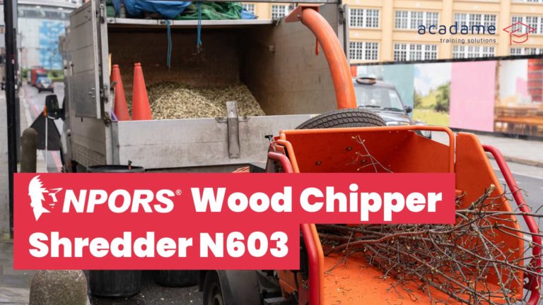 NPORS wood chipper shredder training course image showing a wood chipper processing branches into a work vehicle during roadside or grounds maintenance operations