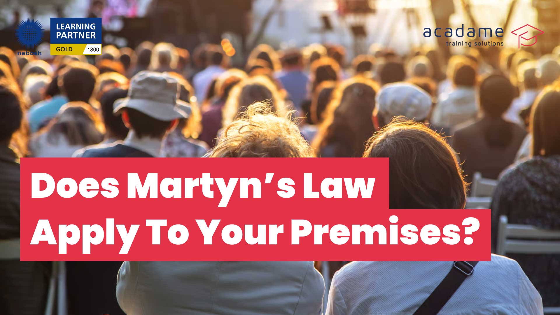 Crowded public event with text overlay asking “Does Martyn’s Law Apply To Your Premises?” promoting terrorism preparedness and NEBOSH Martyn’s Law training qualifications.